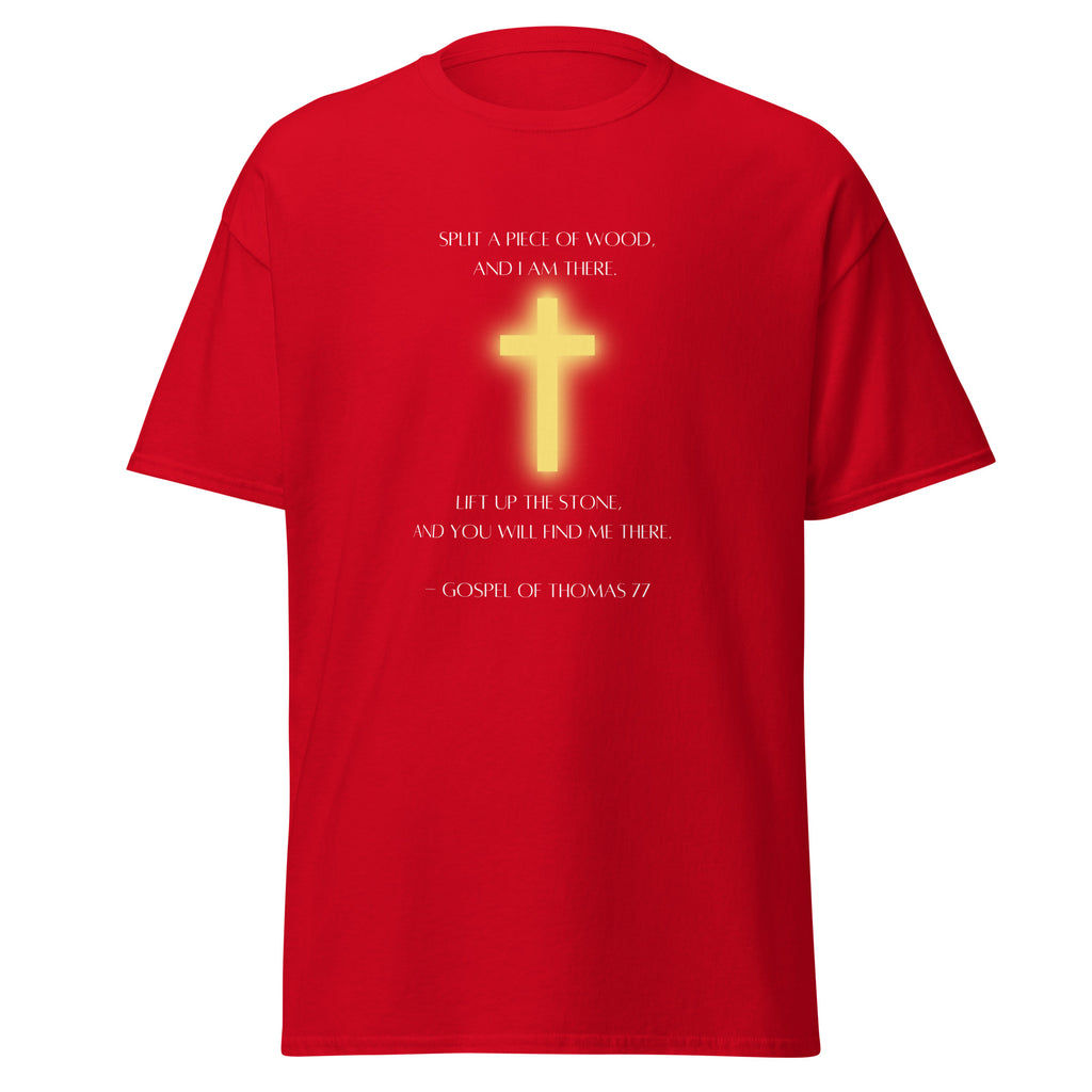 Red T-shirt with a glowing yellow cross and white Gospel of Thomas 77 quote about splitting wood and lifting a stone, front view.