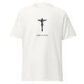White T-shirt with a black crucifix above Christ Is King lettering, front view.